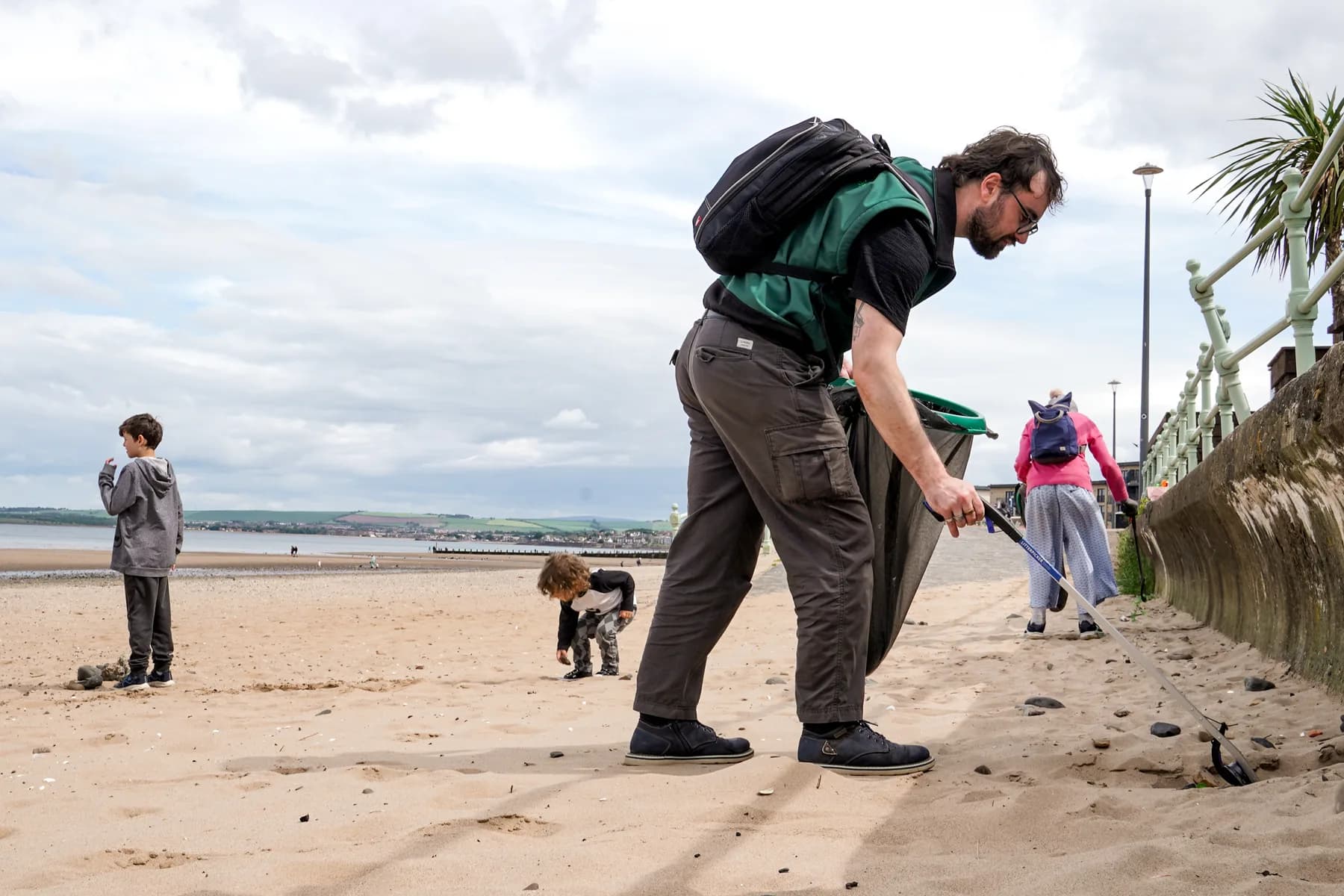 Aaron Baker-Jefferies usually works at the Dog & Cat Home on the Portobello coast, but like many in the community, he wears many hats. Cleaning up the beach with fellow members of his community is one way Baker-Jefferies feels he able to connect with his neighbors and make a visible difference to the place he calls home.